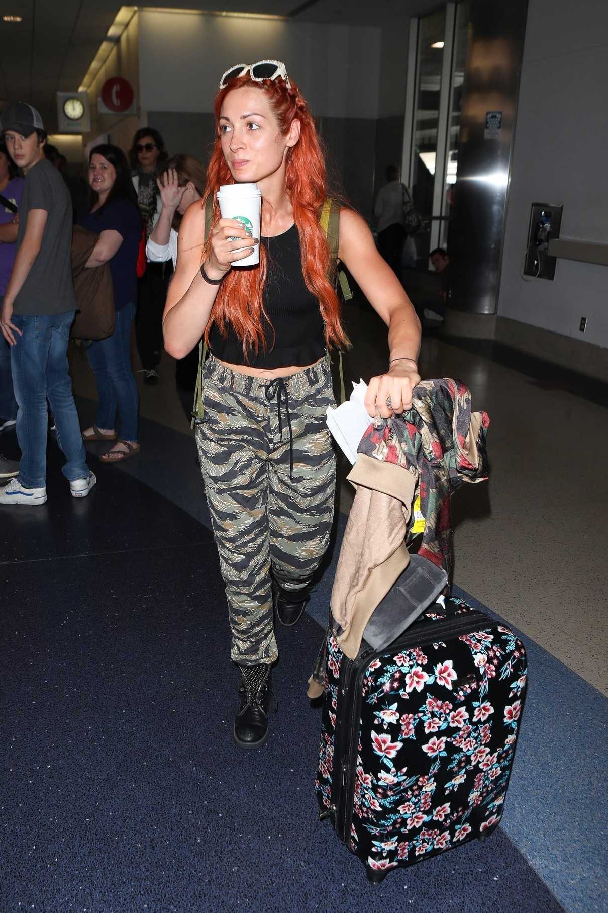 Becky Lynch Enjoys Her Coffee as She Arrives at LAX Airport in Los Angeles 06/06/2018-4