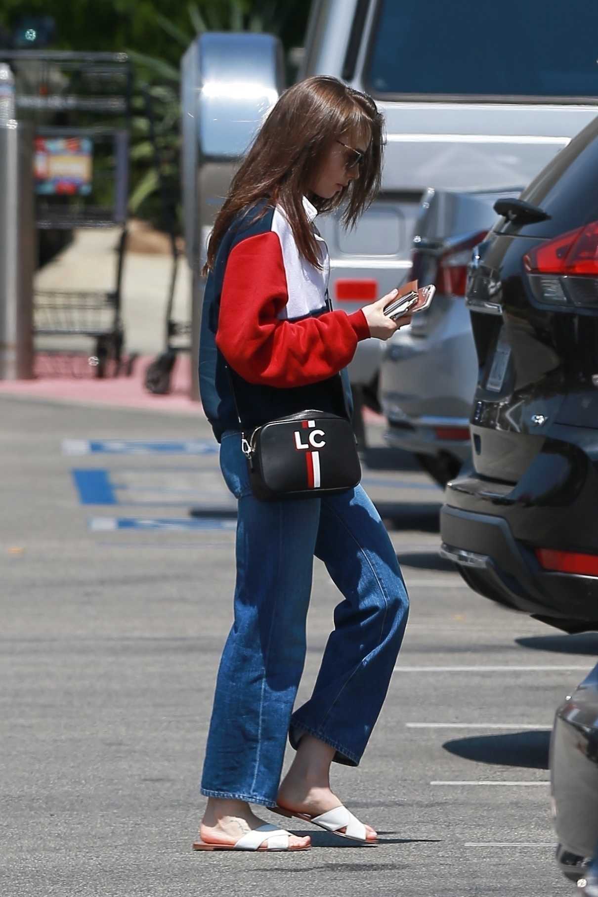 Lily Collins Goes Shopping in West Hollywood 05/31/2018-2