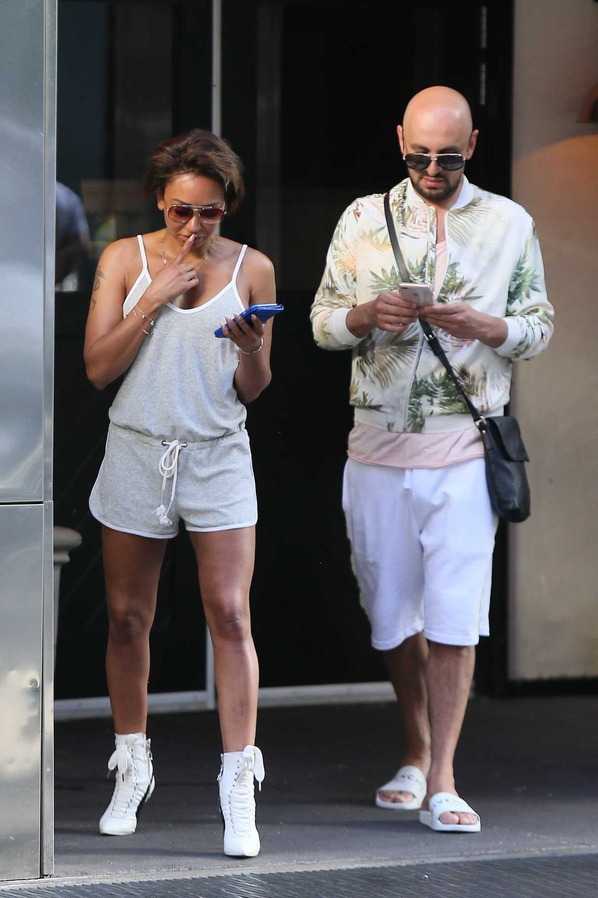 Melanie Brown Was Seen Out with Her Hairstylist Gary Madatyan in Times Square in New York 06/25/2018-1