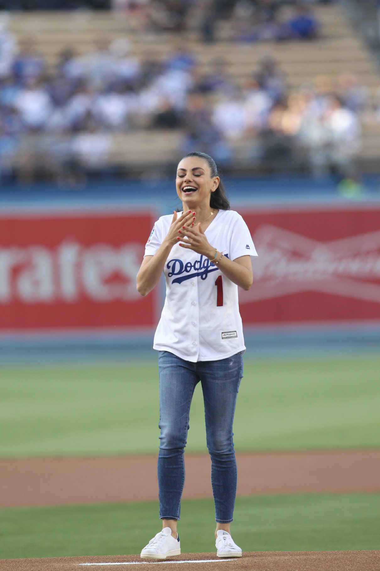 Mila Kunis Throws Out the 1st Pitch Before the Game at Dodger Stadium in Los Angeles 06/29/2018-2