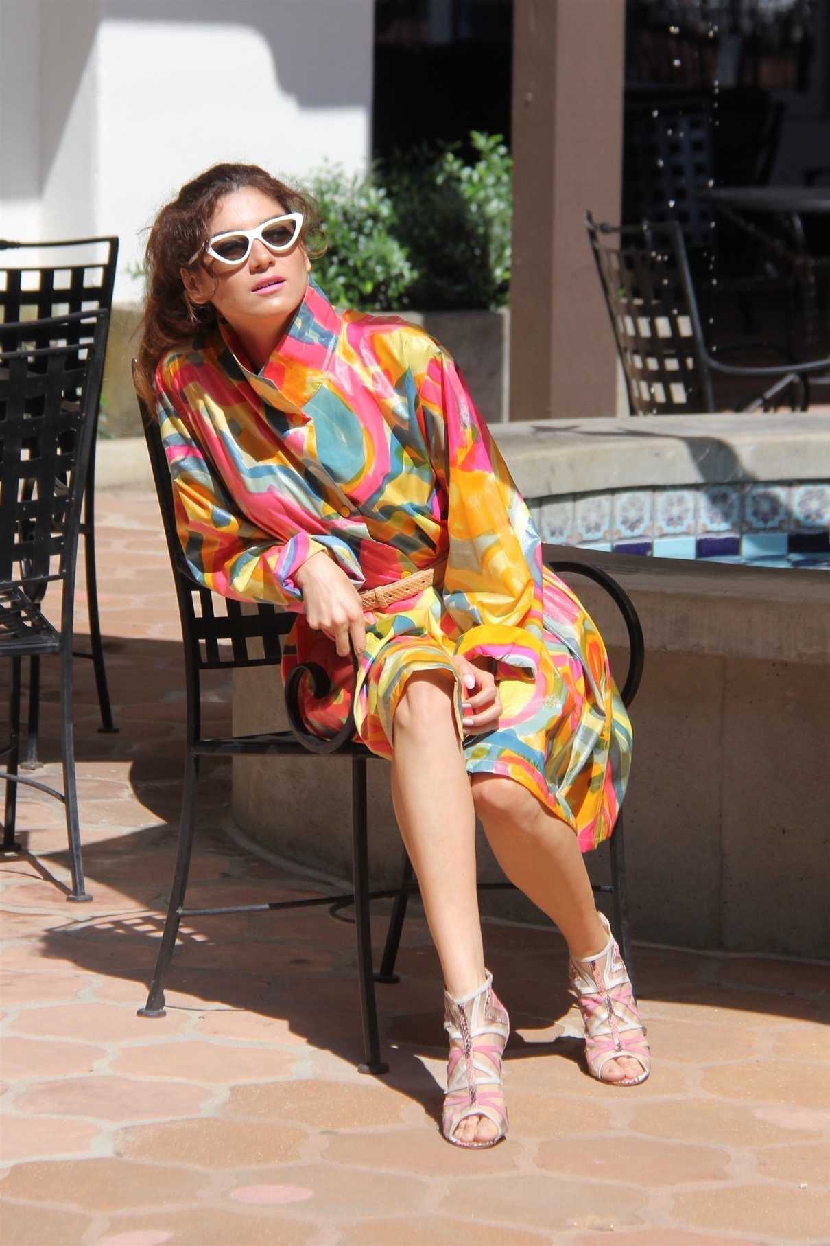 Blanca Blanco in a Bright Wrap Dress