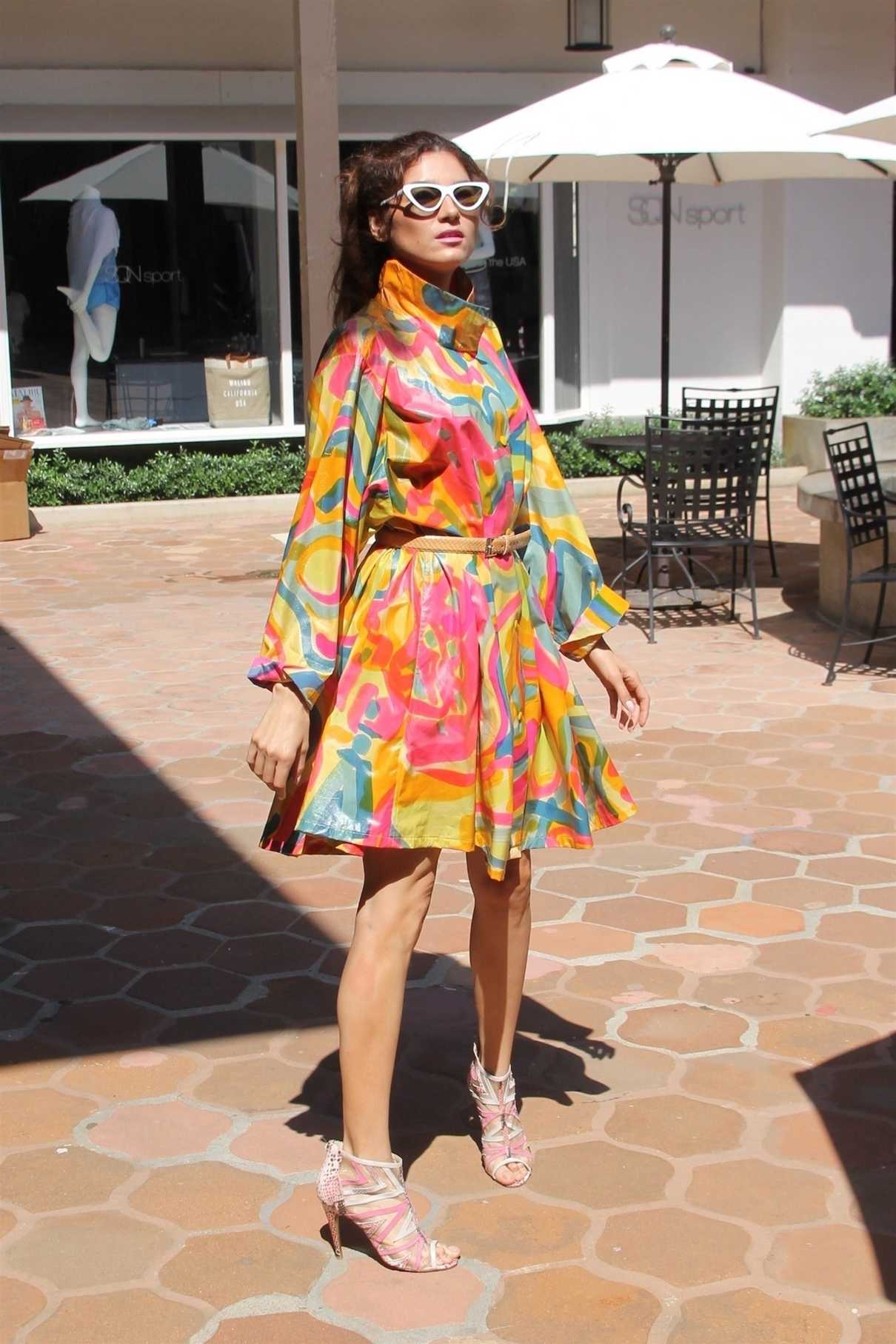 Blanca Blanco in a Bright Wrap Dress