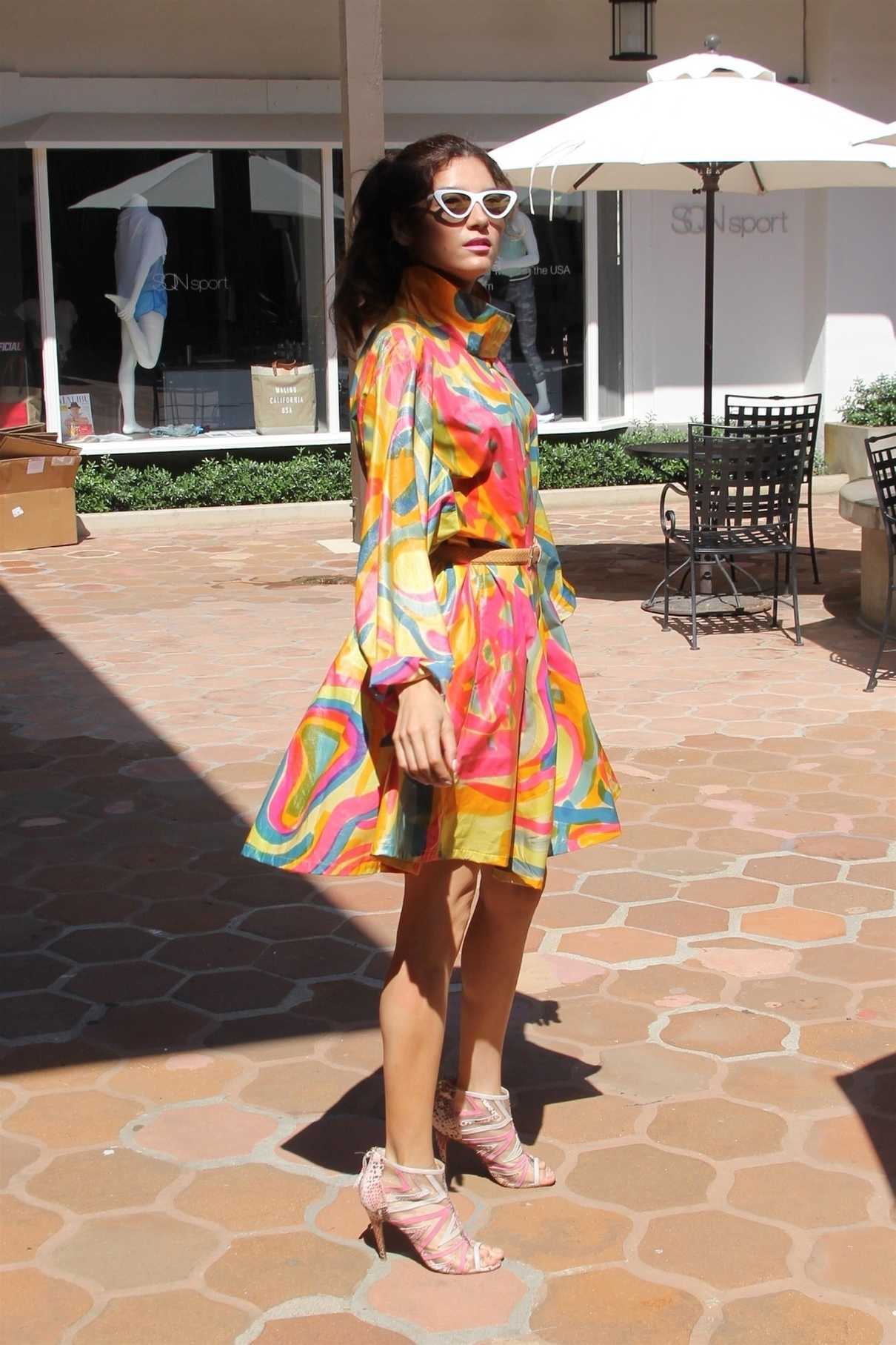 Blanca Blanco in a Bright Wrap Dress