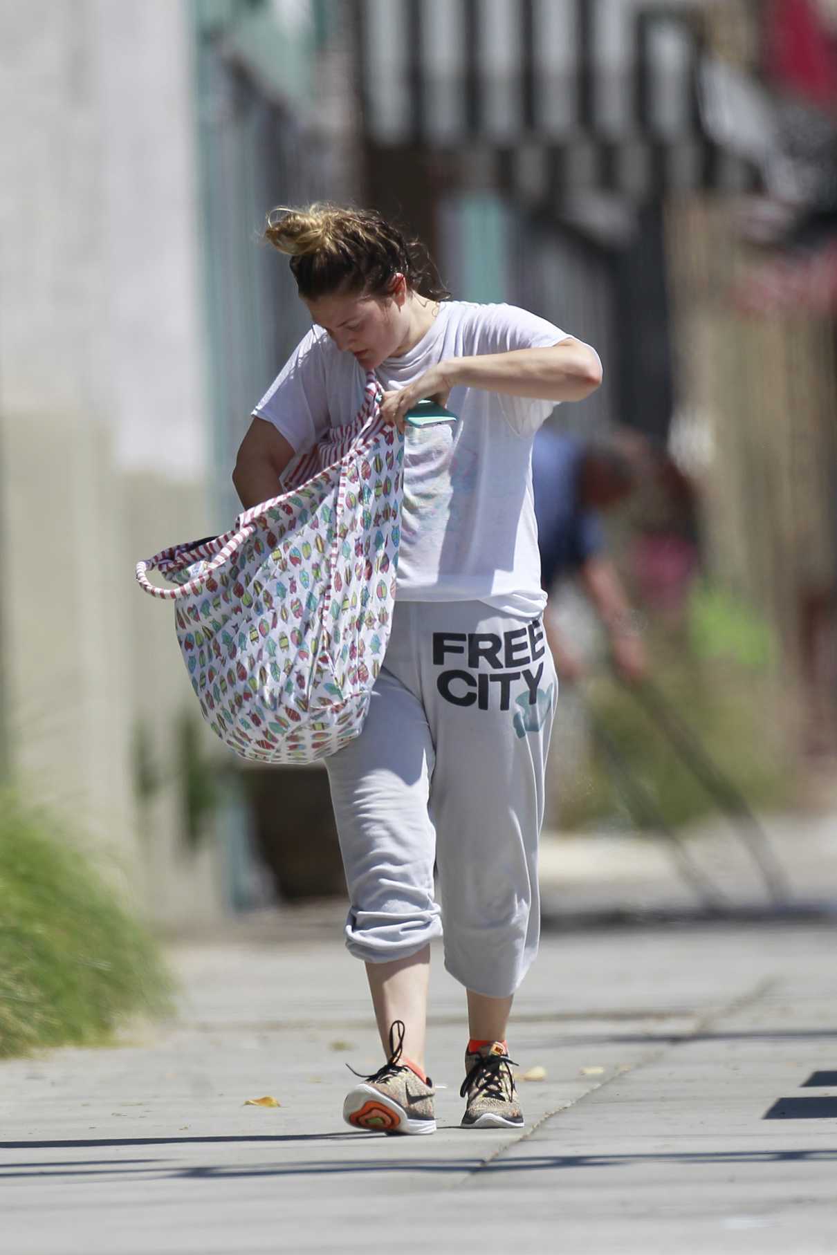 Drew Barrymore Wears Her Old Coca Cola T-Shirt and Nike Sneakers Out in LA 07/16/2018-5