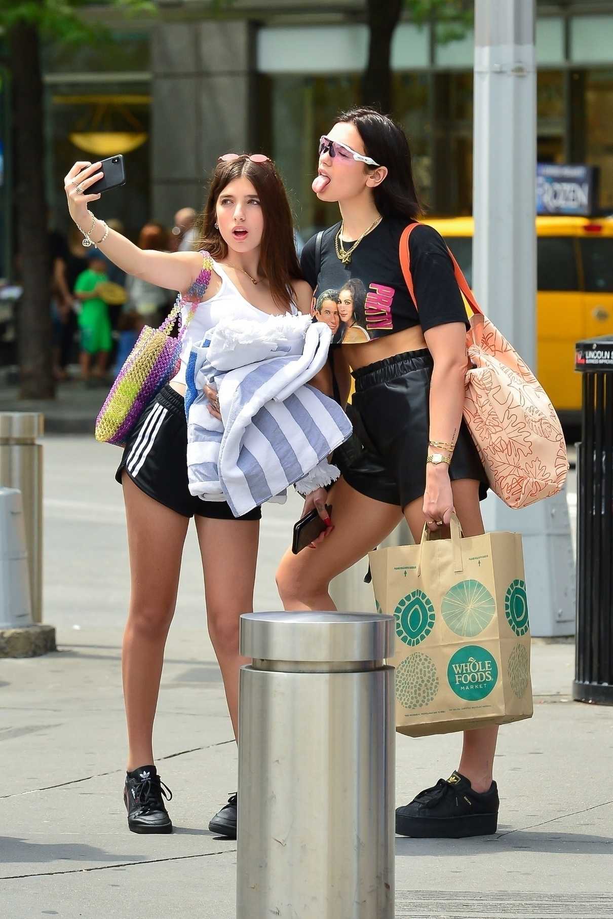 Dua Lipa in a Black Cropped T-Shirt