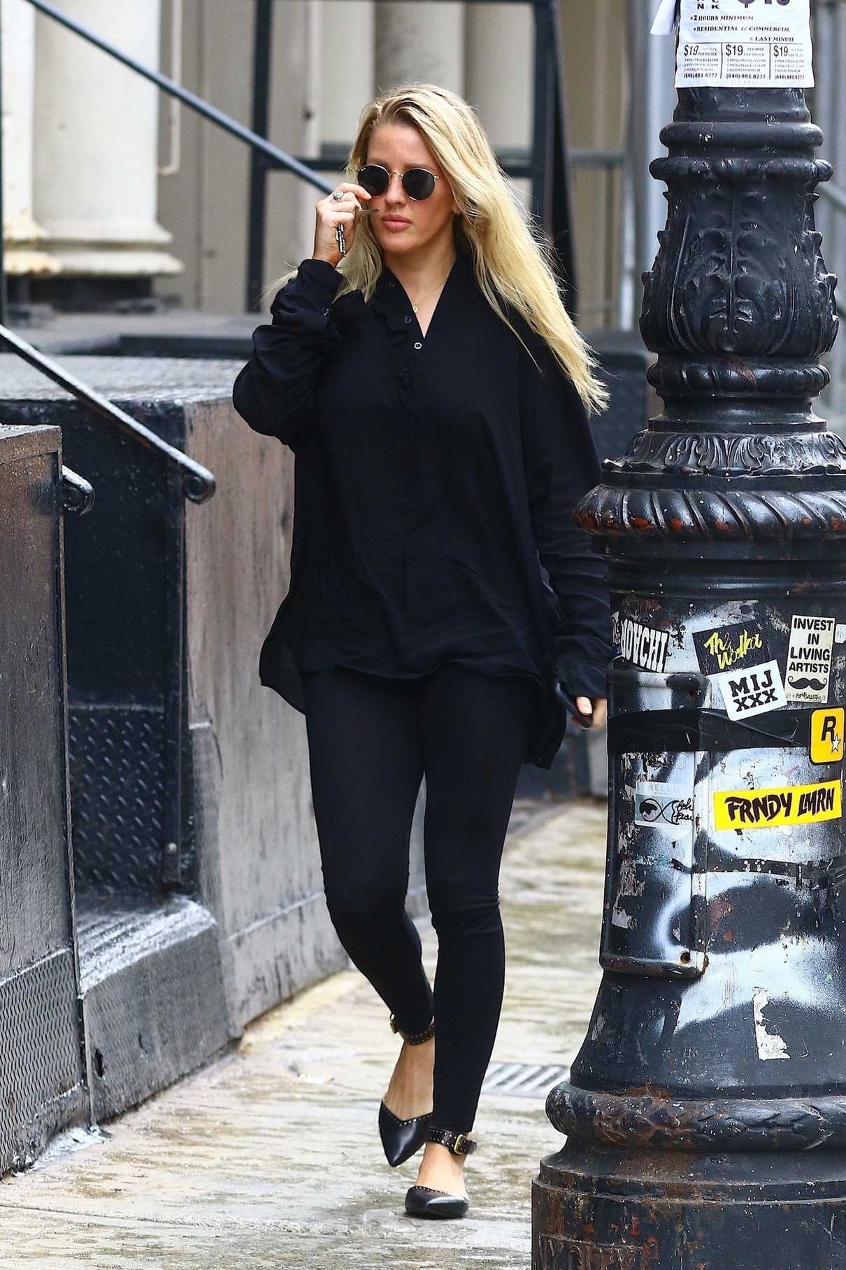 Ellie Goulding in a Black Long Sleeves Blouse