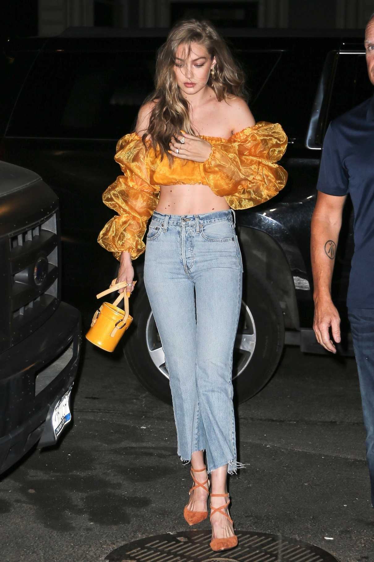 Gigi Hadid in a Yellow Lace Top Night Out in New York City 07/19/2018-2
