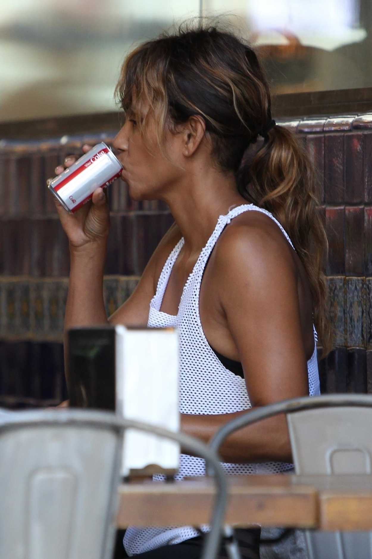 Halle Berry Was Seen in a White Tank Top and New Balance Sneakers Out in Los Angeles 07/14/2018-5