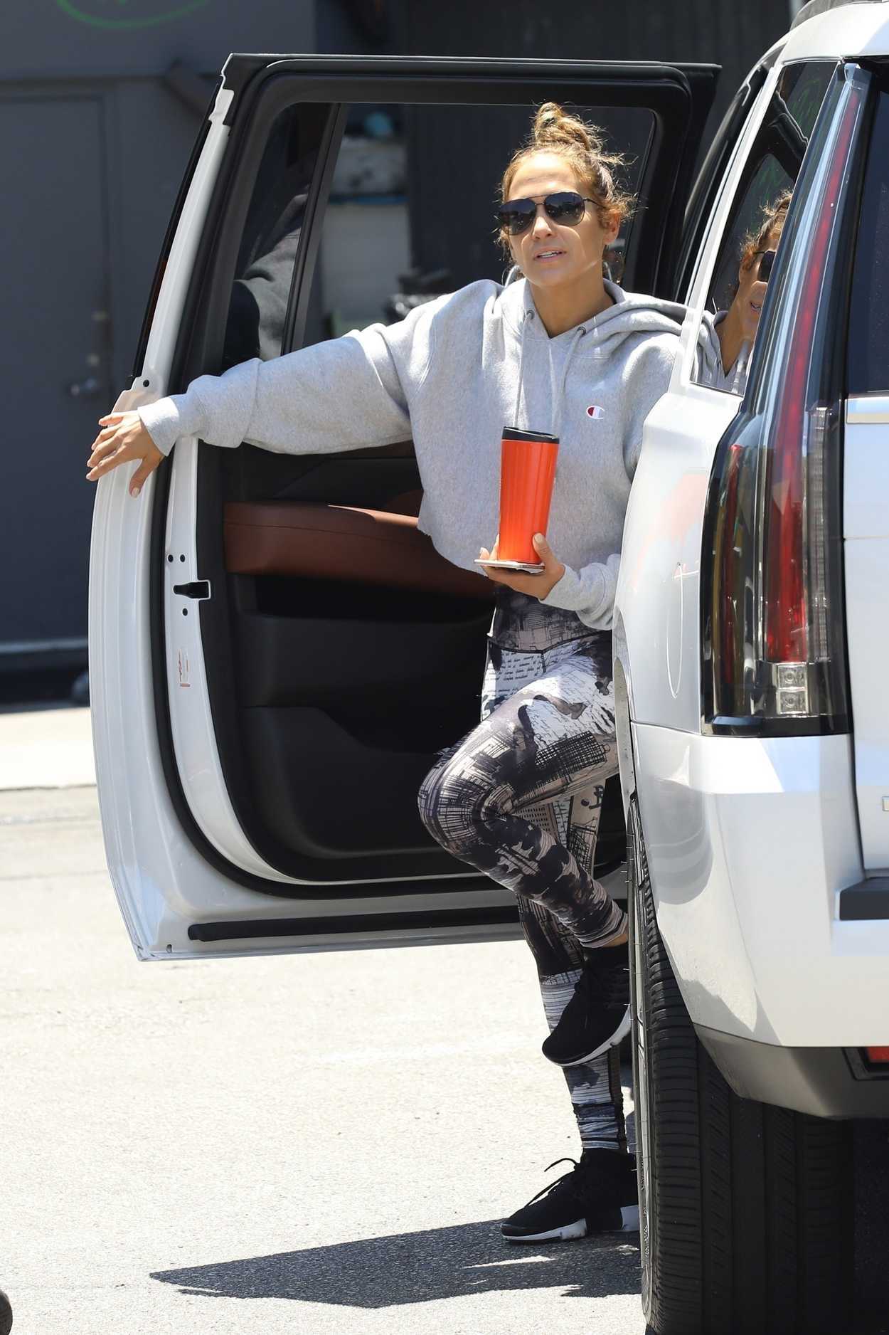 Jennifer Lopez in a Grey Hoody and Nike Sneakers Steps Out for a Morning Workout in Beverly Hills 07/14/2018-3