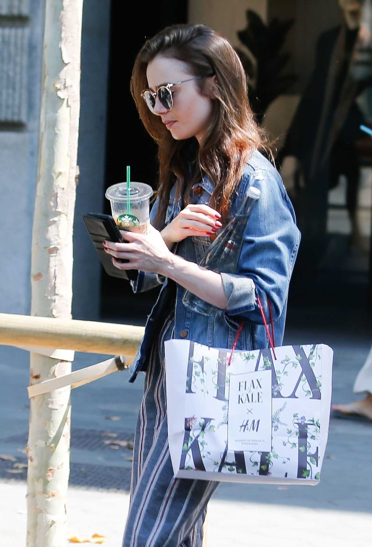 The 29-year-old actress Lily Collins was spotted out in Barcelona.-4