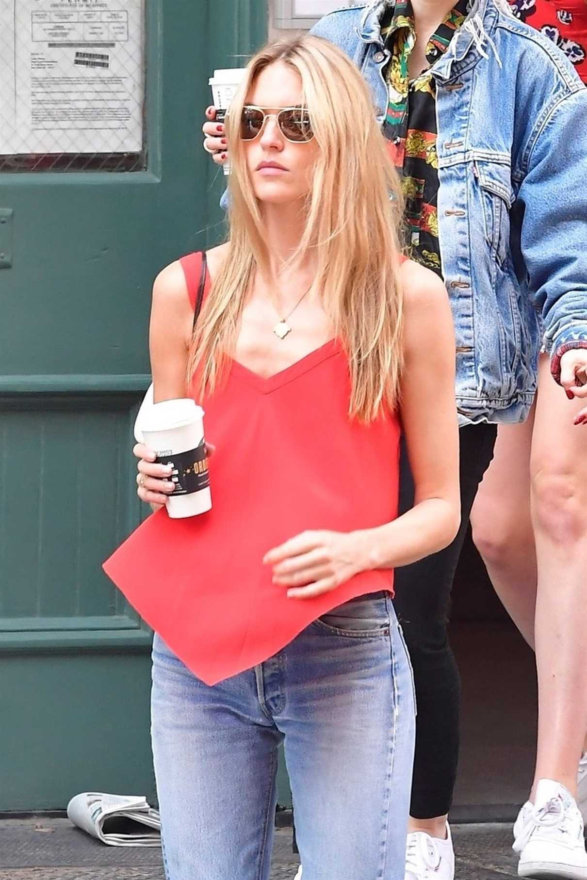 Martha Hunt Leaves Taylor Siwft's Apartment in New York City 07/13/2018-5