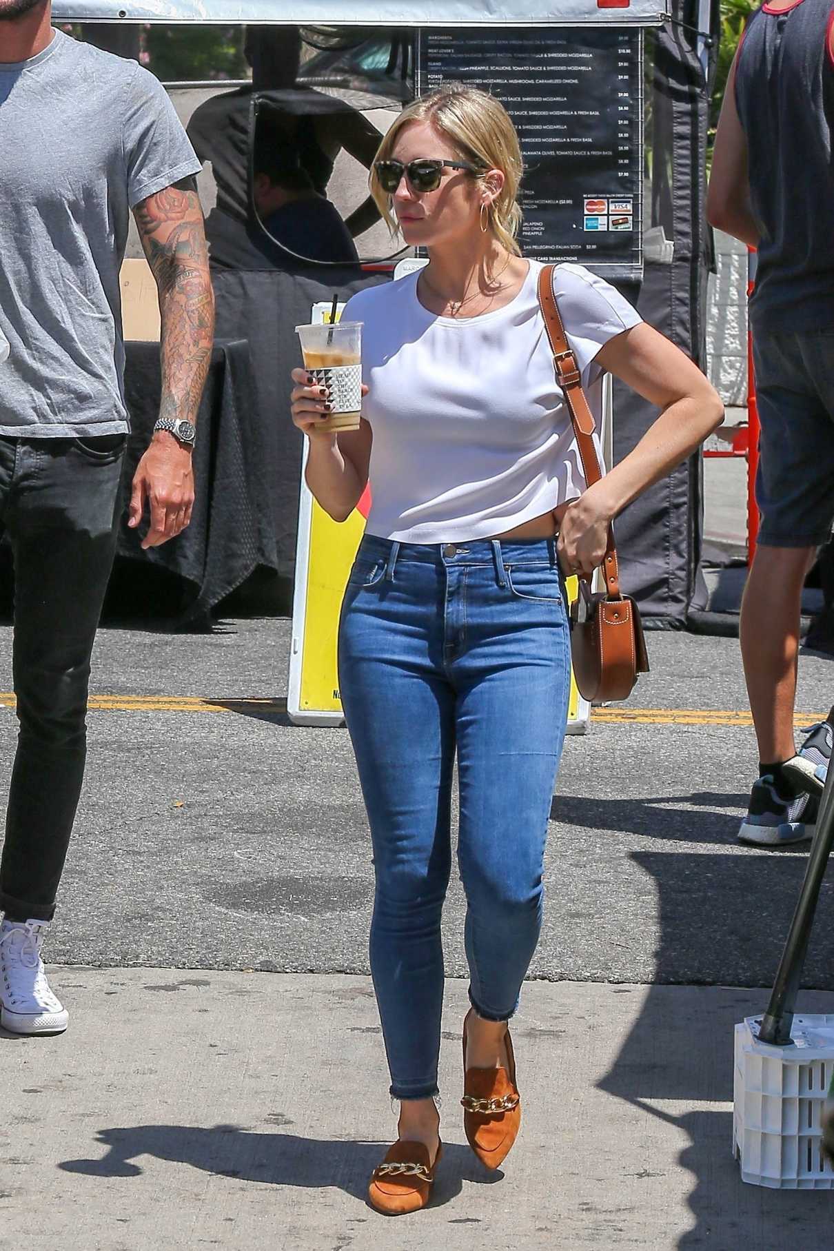 Brittany Snow in a Blue Slim Jeans