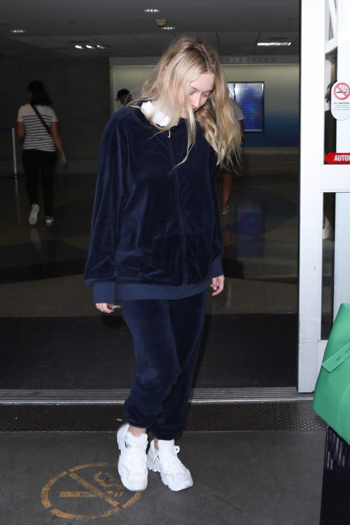 Dakota Fanning in a Blue Tracksuit