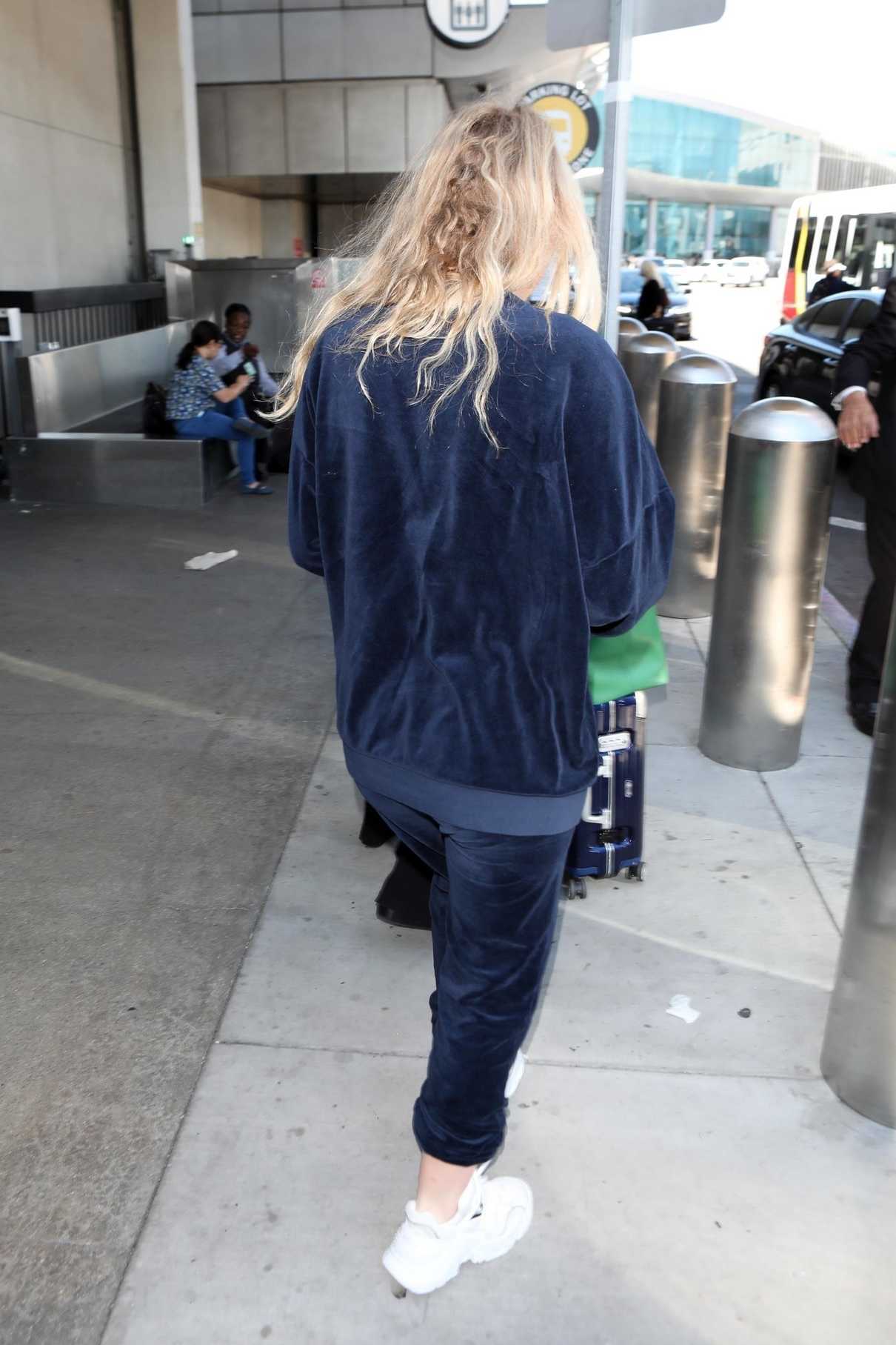 Dakota Fanning in a Blue Tracksuit