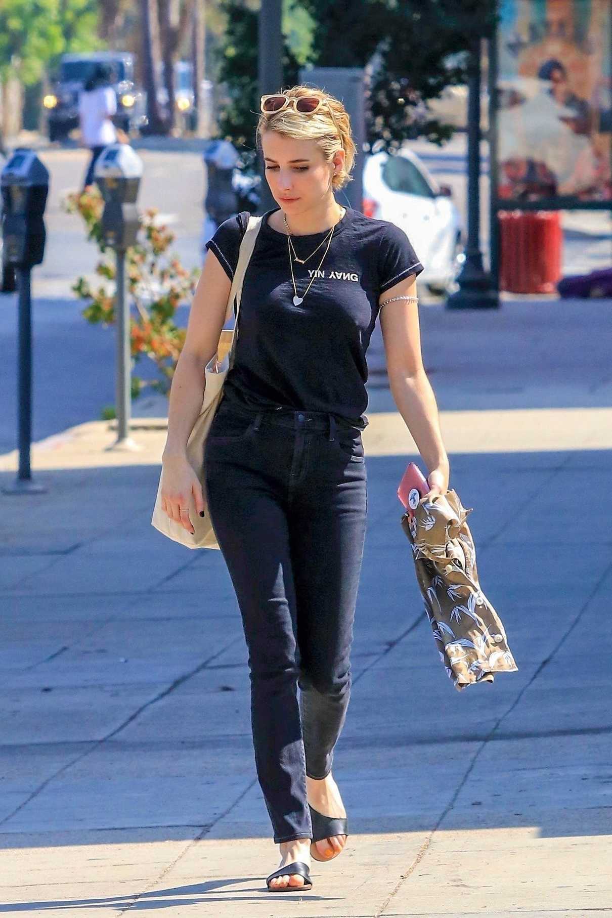Emma Roberts in a Black T-Shirt