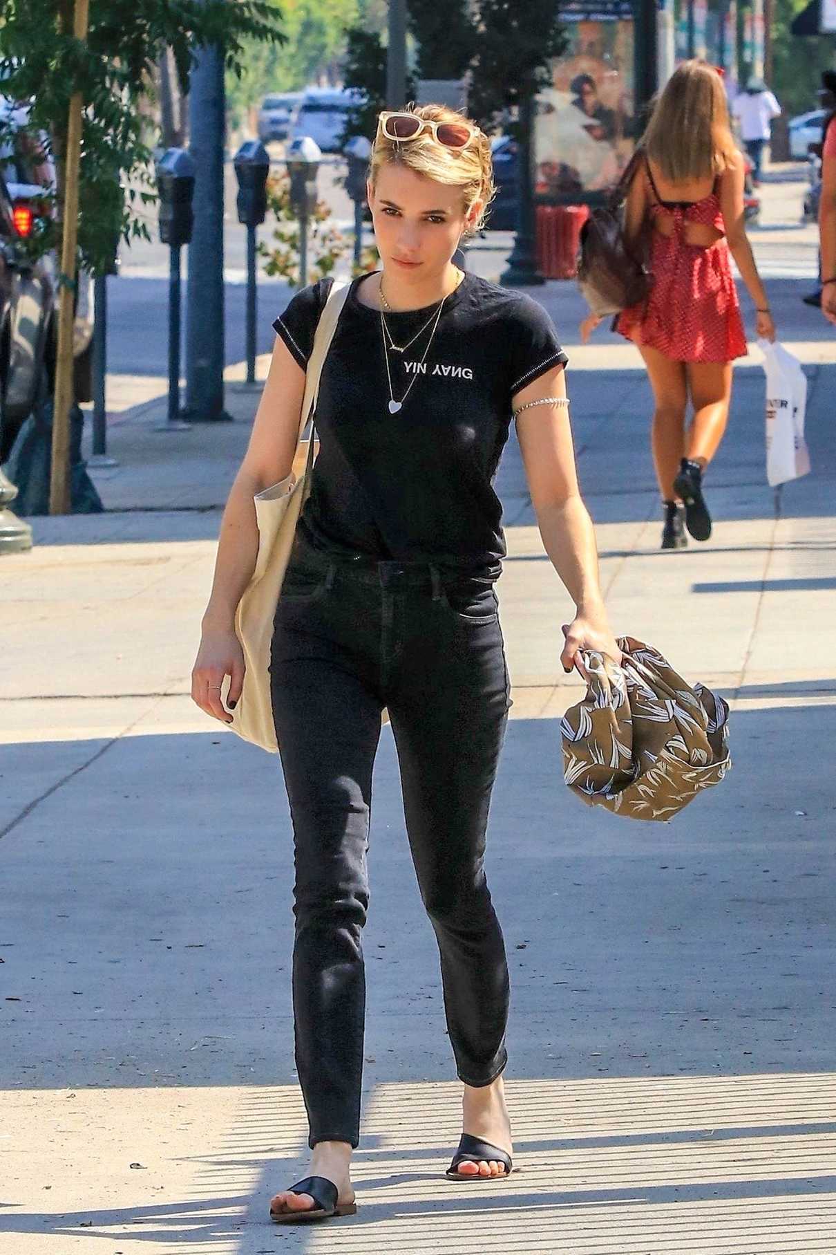 Emma Roberts in a Black T-Shirt