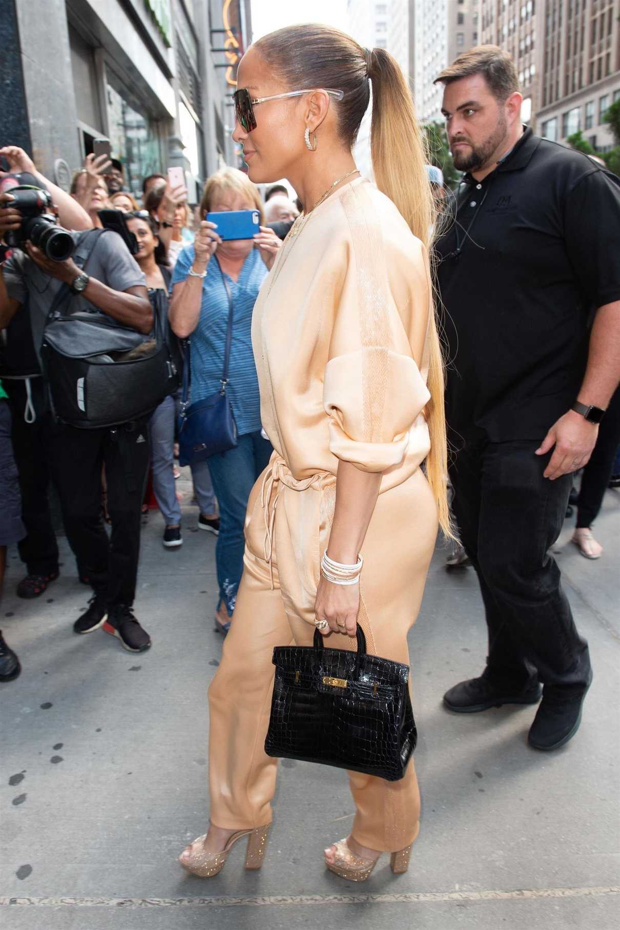 Jennifer Lopez in a Beige Suit