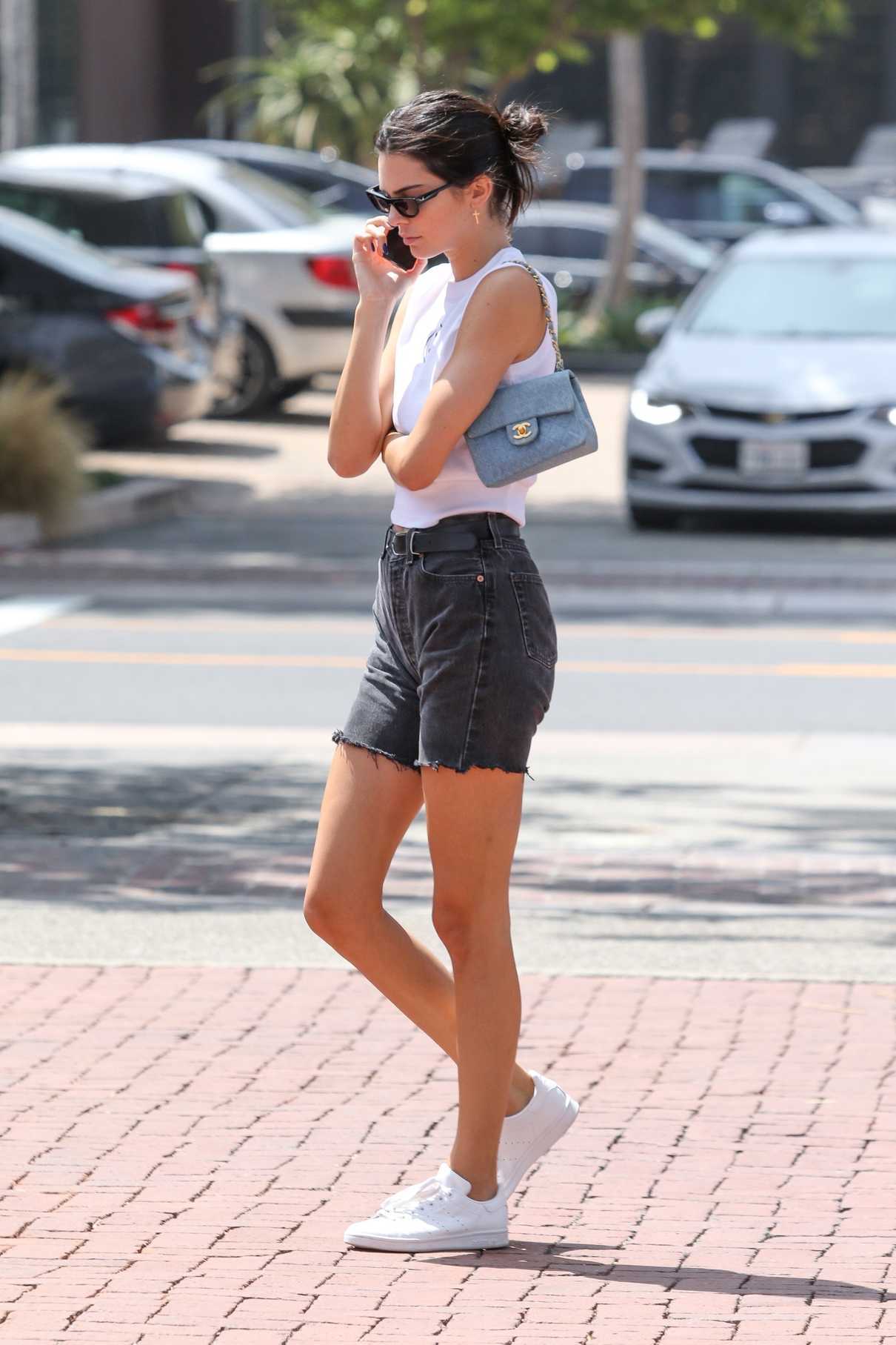 Kendall Jenner in a Black Denim Shorts