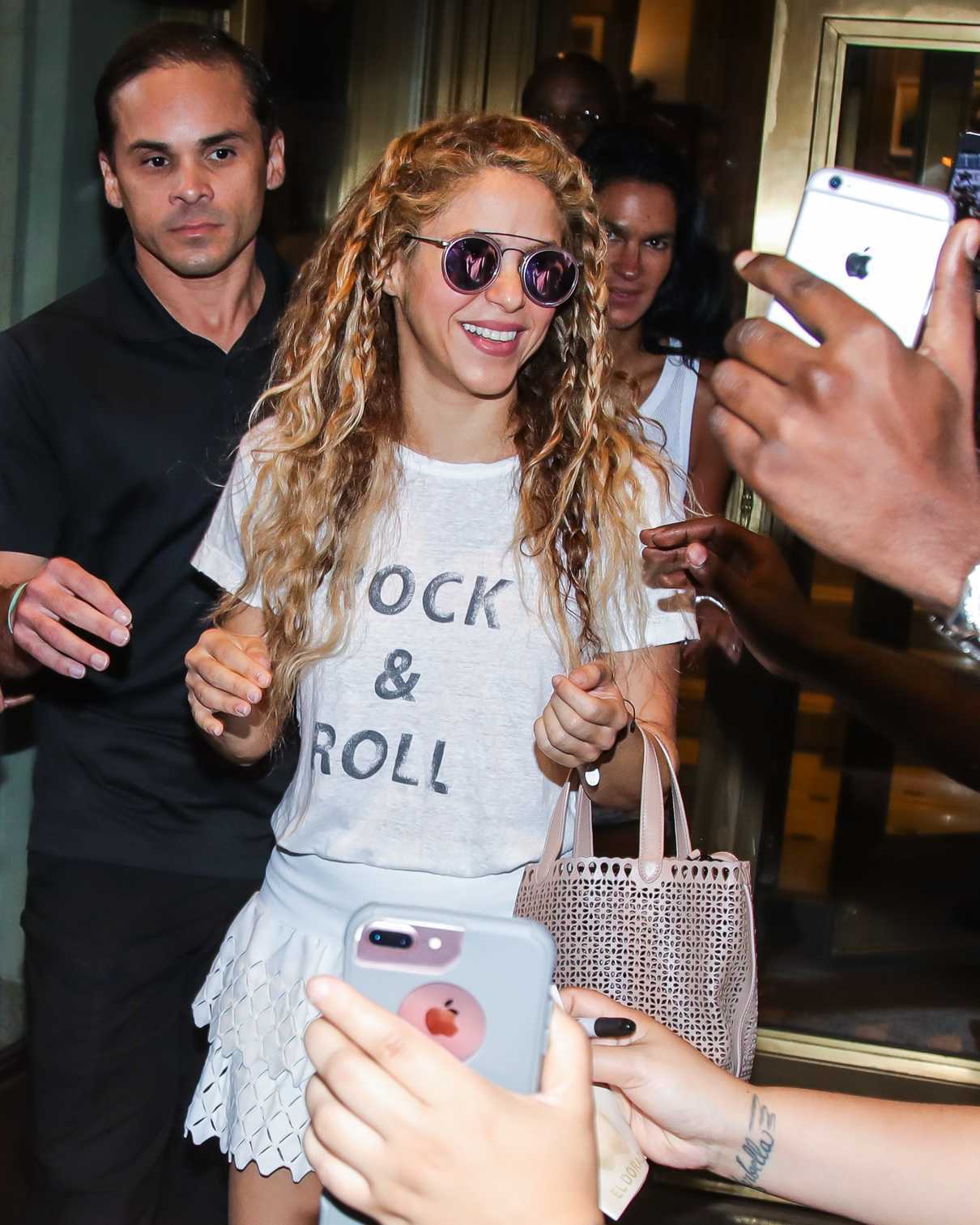Shakira in a White Rock and Roll T-Shirt
