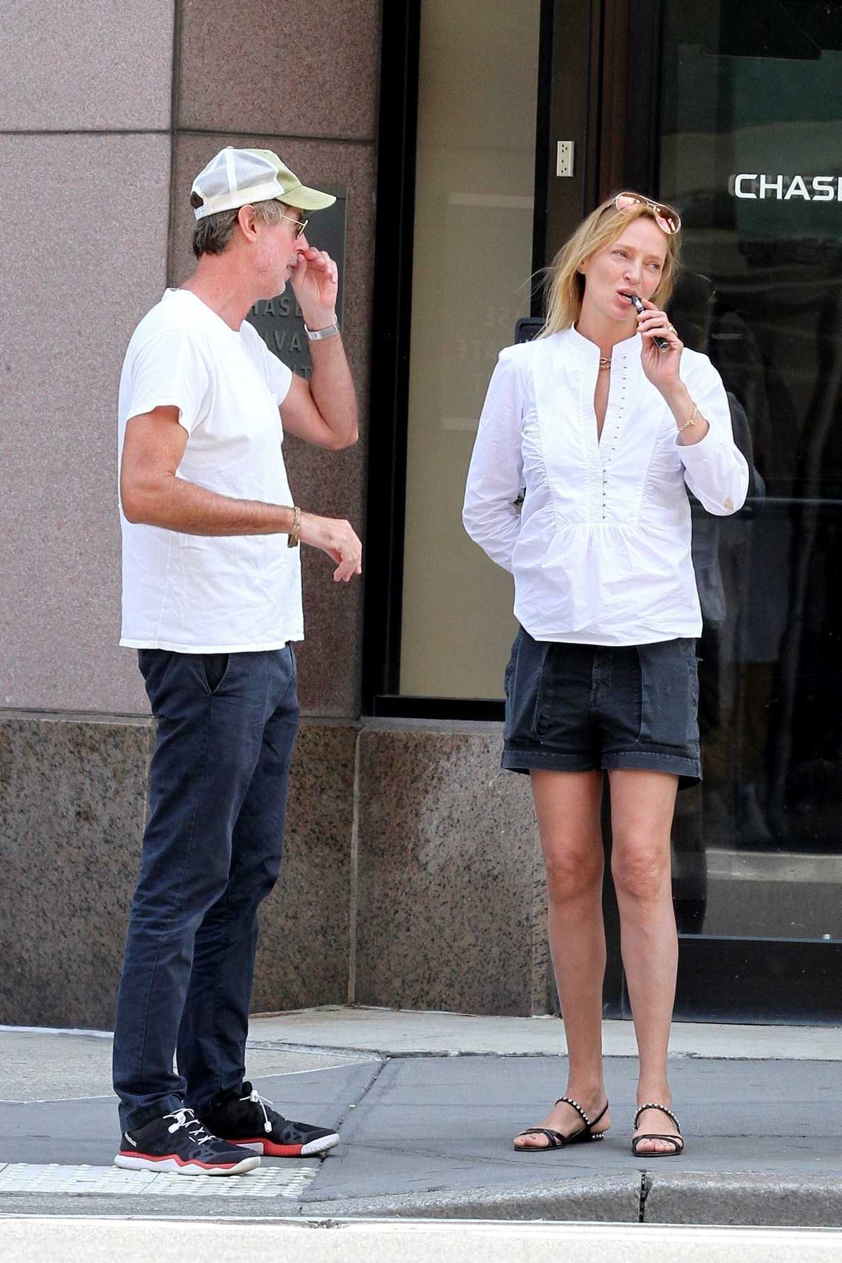 Uma Thurman in a White Long Sleeves Blouse