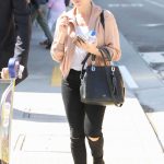 Brittany Snow in a Black Cap Arrives at LAX Airport in LA 09/21/2018