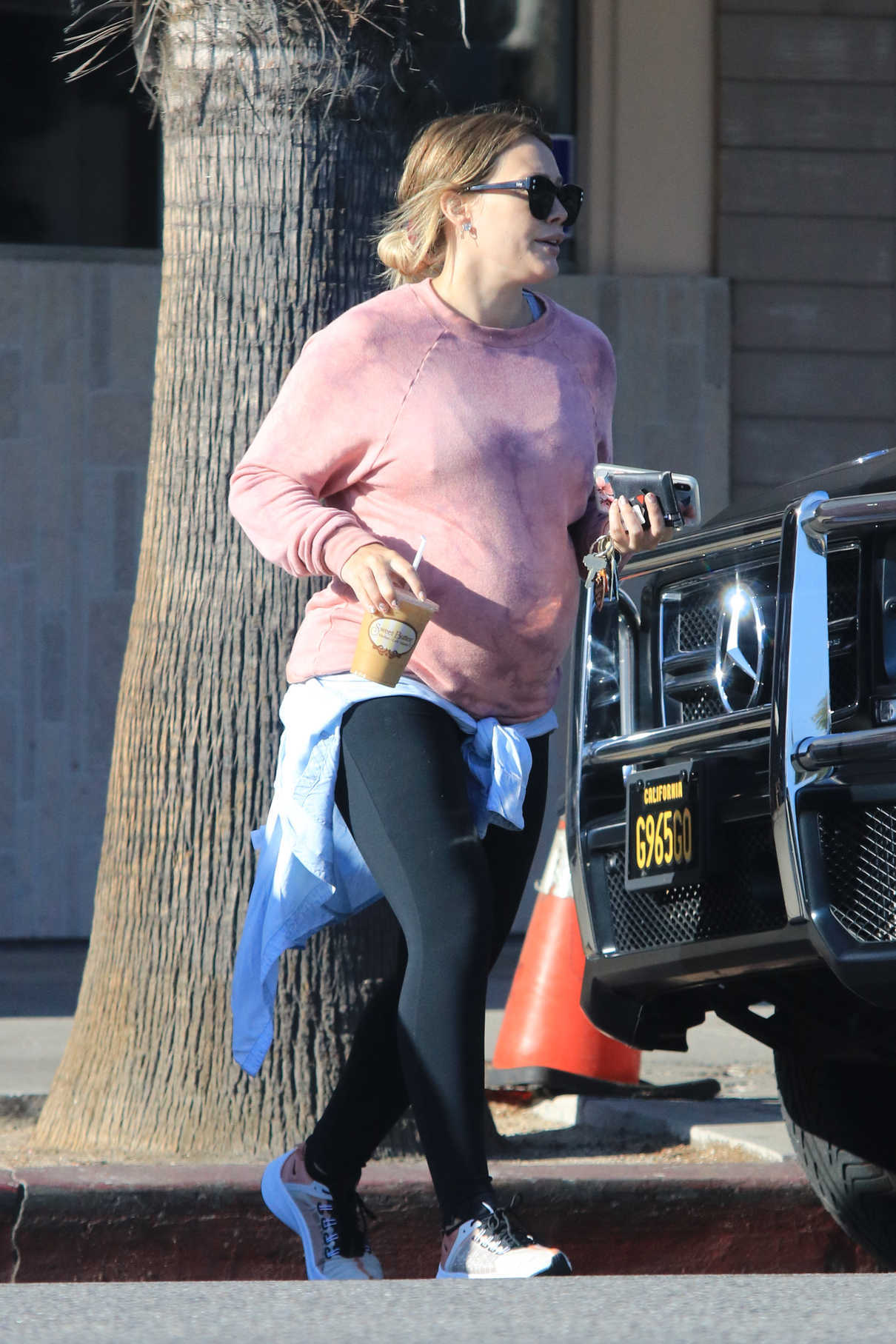 Hilary Duff in a Pink Sweatshirt