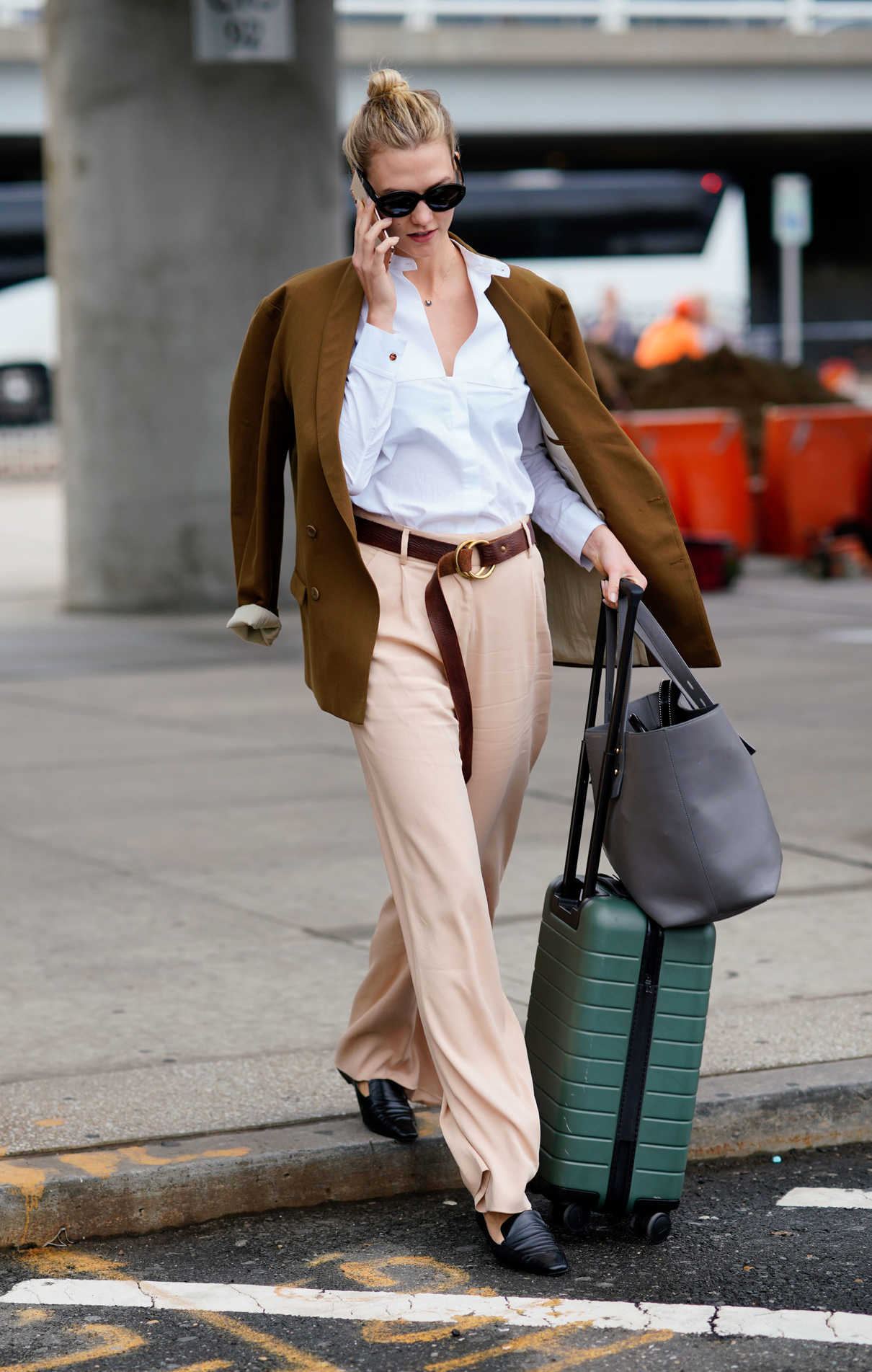 Karlie Kloss in a White Blouse Touches Down at JFK Airport in NYC 09/28 ...
