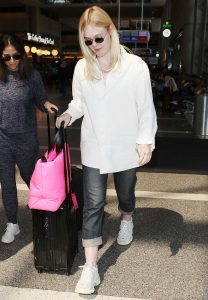 Elle Fanning in a White Long Sleeves Shirt
