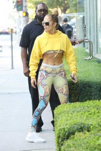 Jennifer Lopez in a Yellow Cropped Hoody