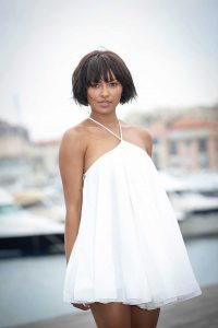 Kat Graham in a Short White Babydoll Dress