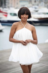 Kat Graham in a Short White Babydoll Dress