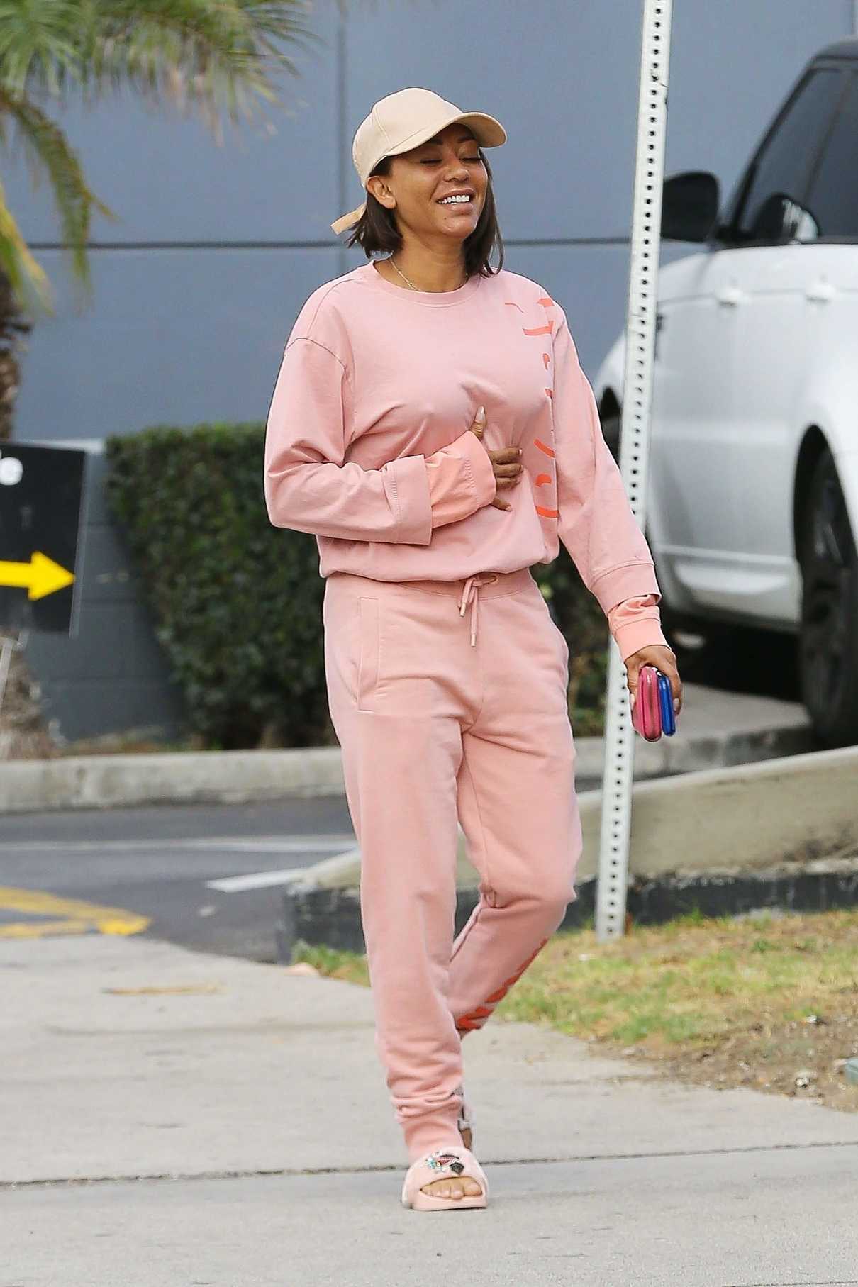 Melanie Brown in a Pink Jogging Suit