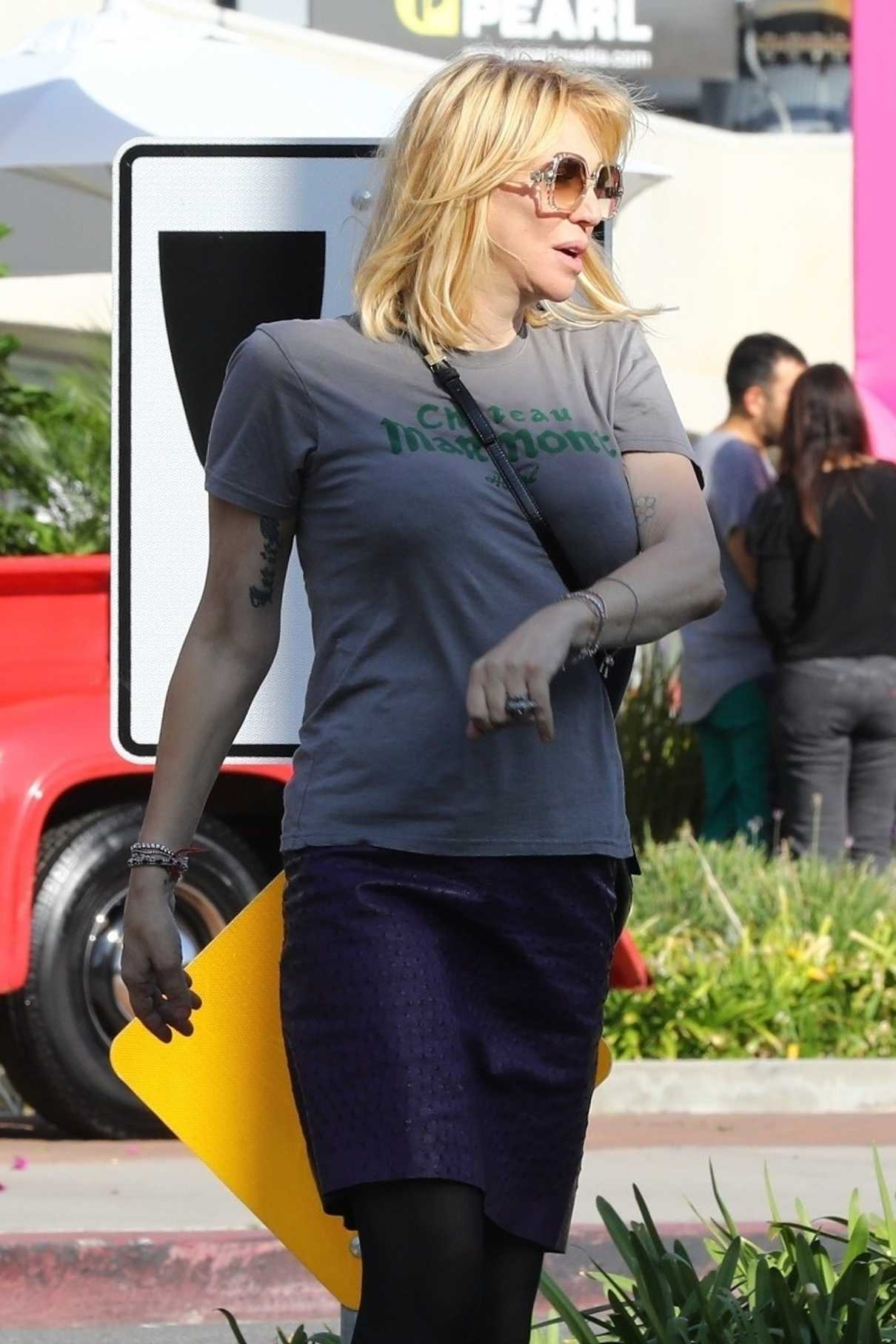 Courtney Love in a Gray T-Shirt Was Seen on Melrose Place in West ...