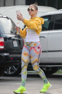 Jennifer Lopez in a Yellow Cropped Hoody
