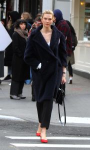 Karlie Kloss in a Dark Blue Fur Coat