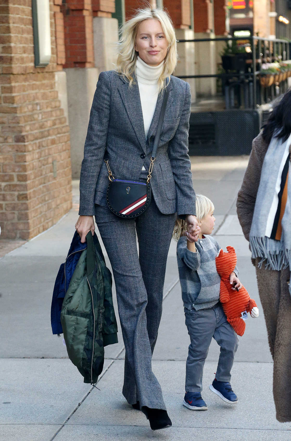 Karolina Kurkova in a Gray Suit