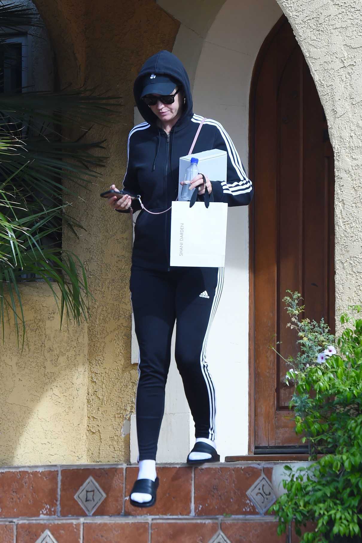 Katy Perry in a Navy Adidas Tracksuit Leaves a Friends House in Los Angeles 11/27/2018-2 LACELEBS.CO