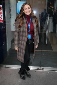 Kelly Brook in a Plaid Coat