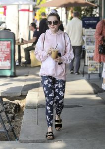 Kiernan Shipka in a Black Floral Leggings