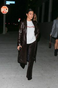 Kourtney Kardashian in a Brown Leather Trench Coat