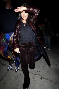 Kourtney Kardashian in a Brown Leather Trench Coat