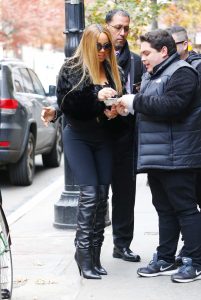 Mariah Carey in a Short Black Fur Coat