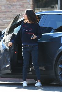 Mila Kunis in a Blue Easy Like Sunday Morning Sweatshirt