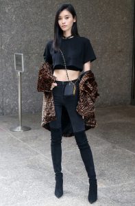 Ming Xi in a Black Cropped T-Shirt