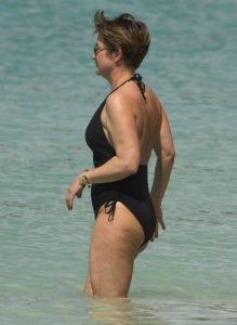 Emma Forbes in a Black Swimsuit