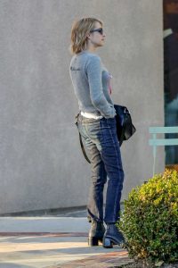 Emma Roberts in a Gray Sweater
