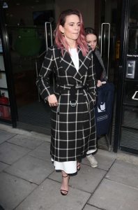 Hayley Atwell in a Black Plaid Coat