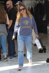 Jennifer Meyer in a Blue Ripped Jeans