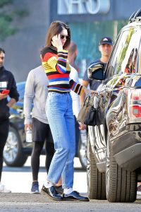 Kendall Jenner in a Striped Rainbow Sweater