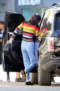Kendall Jenner in a Striped Rainbow Sweater